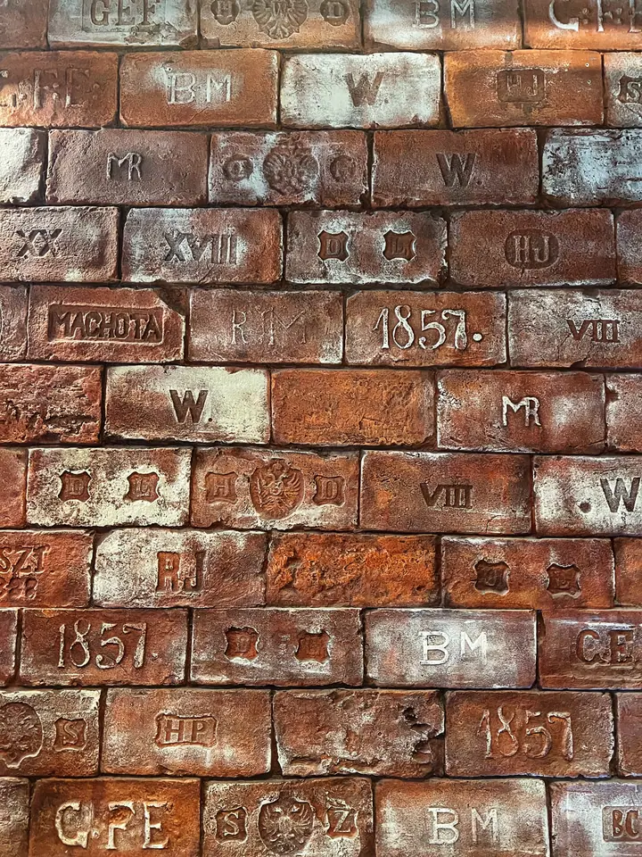 Brick detail showing stamped marks and aged material texture.